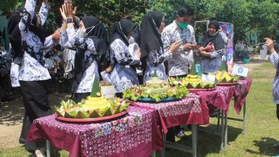 HGN, SMKN 1 Way Kenanga Adakan Upacara Hingga Bhakti Sosial