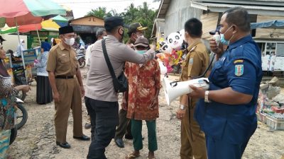 Operasi Yustisi di Pasar, Polsek Negeri Besar Bersama Tim Gugus Tugas Tertibkan Prokes