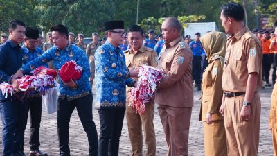 Penyerahan 10 Juta Bendera Merah Putih dalam Apel Bulanan Pemerintah Kabupaten Way Kanan