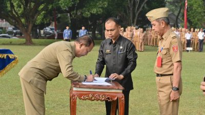 Serah Terima Jabatan Pj. Sekda Lampung Barat: Drs. Adi Utama Serahkan Tugas kepada Drs. Ismet Inoni